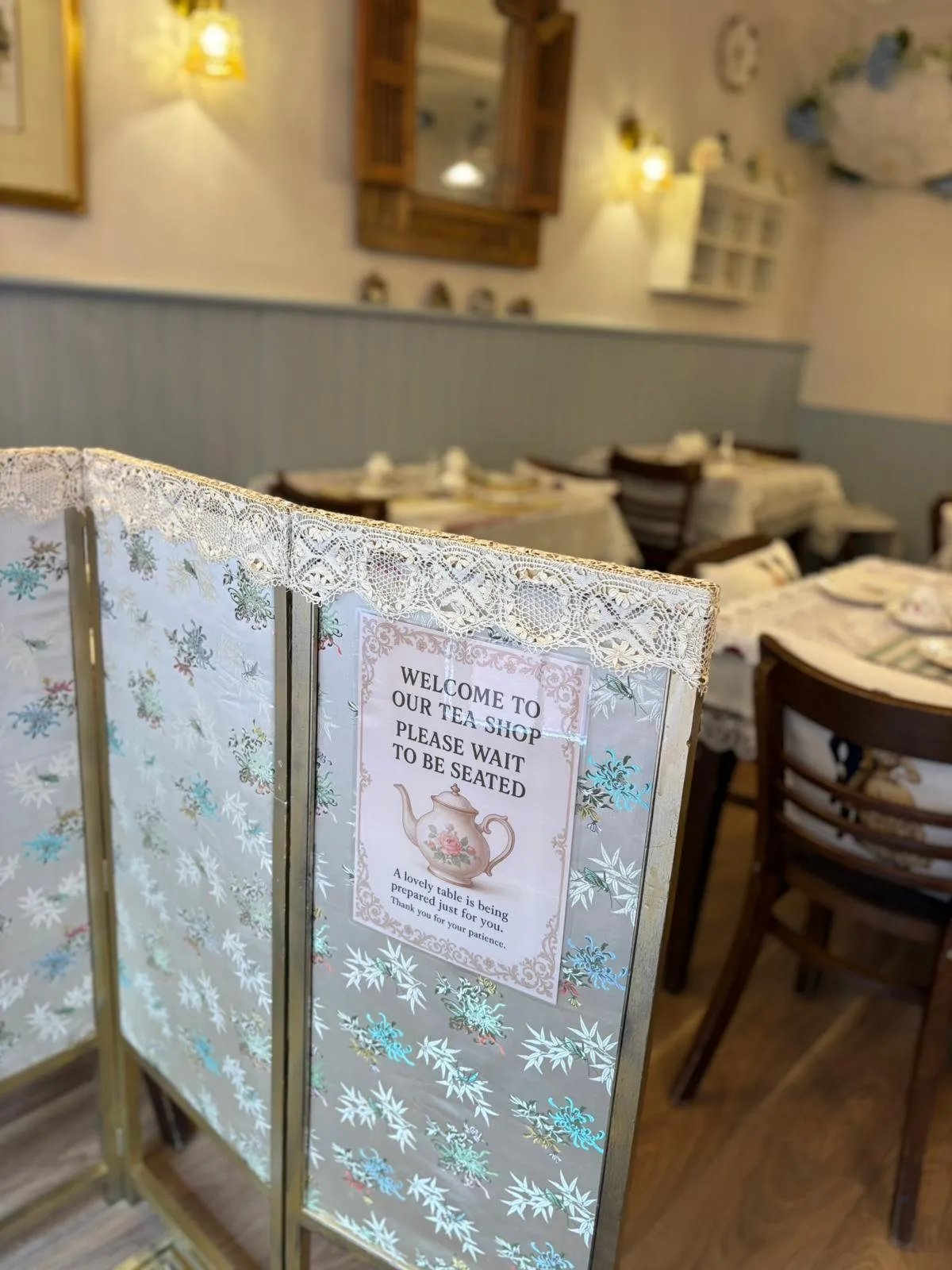 The welcome sign inside our vintage tearoom